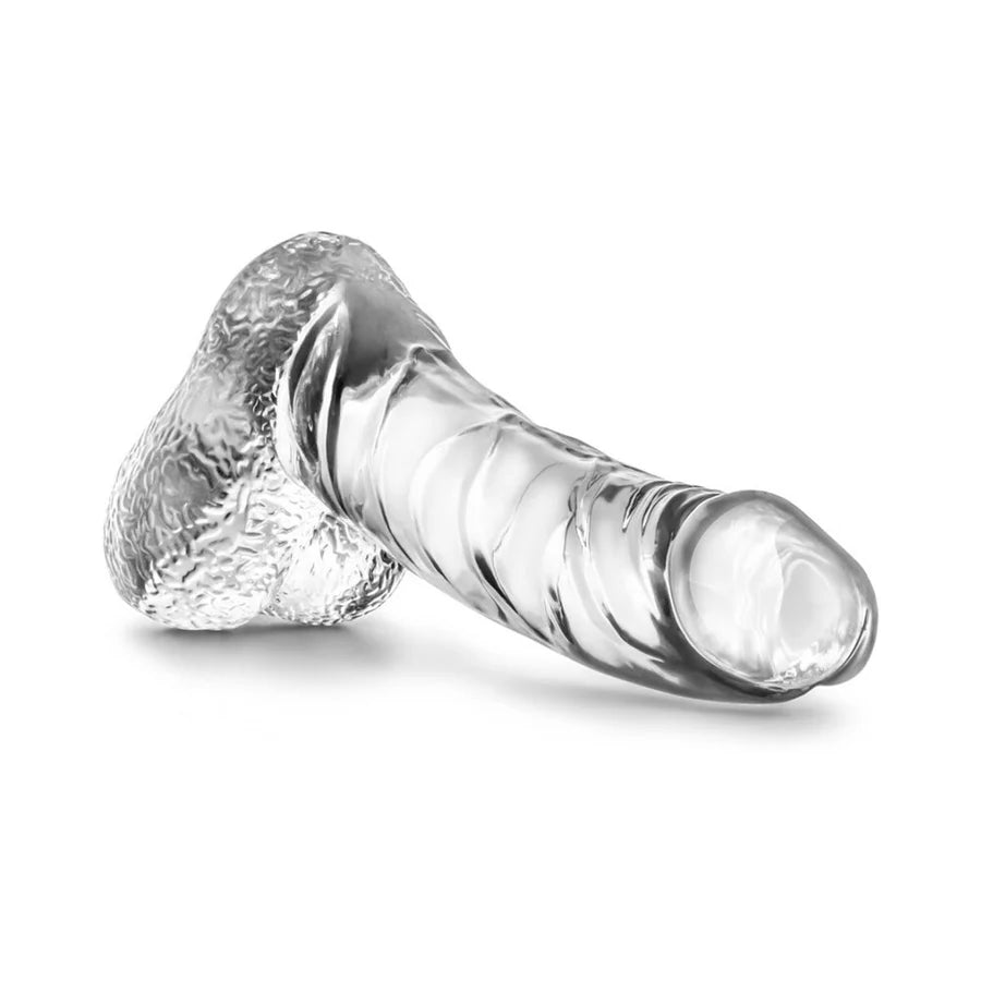 Naturally Yours Ding Dong Realistic 5.5 in. Dildo with Balls showcasing its lifelike design and soft texture for a fulfilling experience.