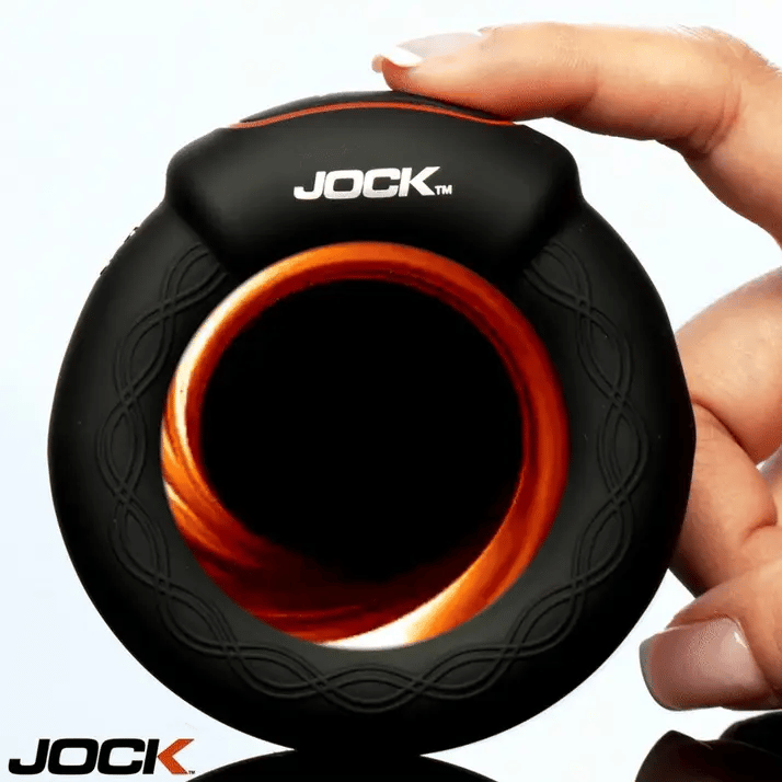 Close-up of the silky silicone material of the JOCK Rumbler 1.8 in. Vibrating C-Ring, highlighting its comfortable fit and body-safe qualities.