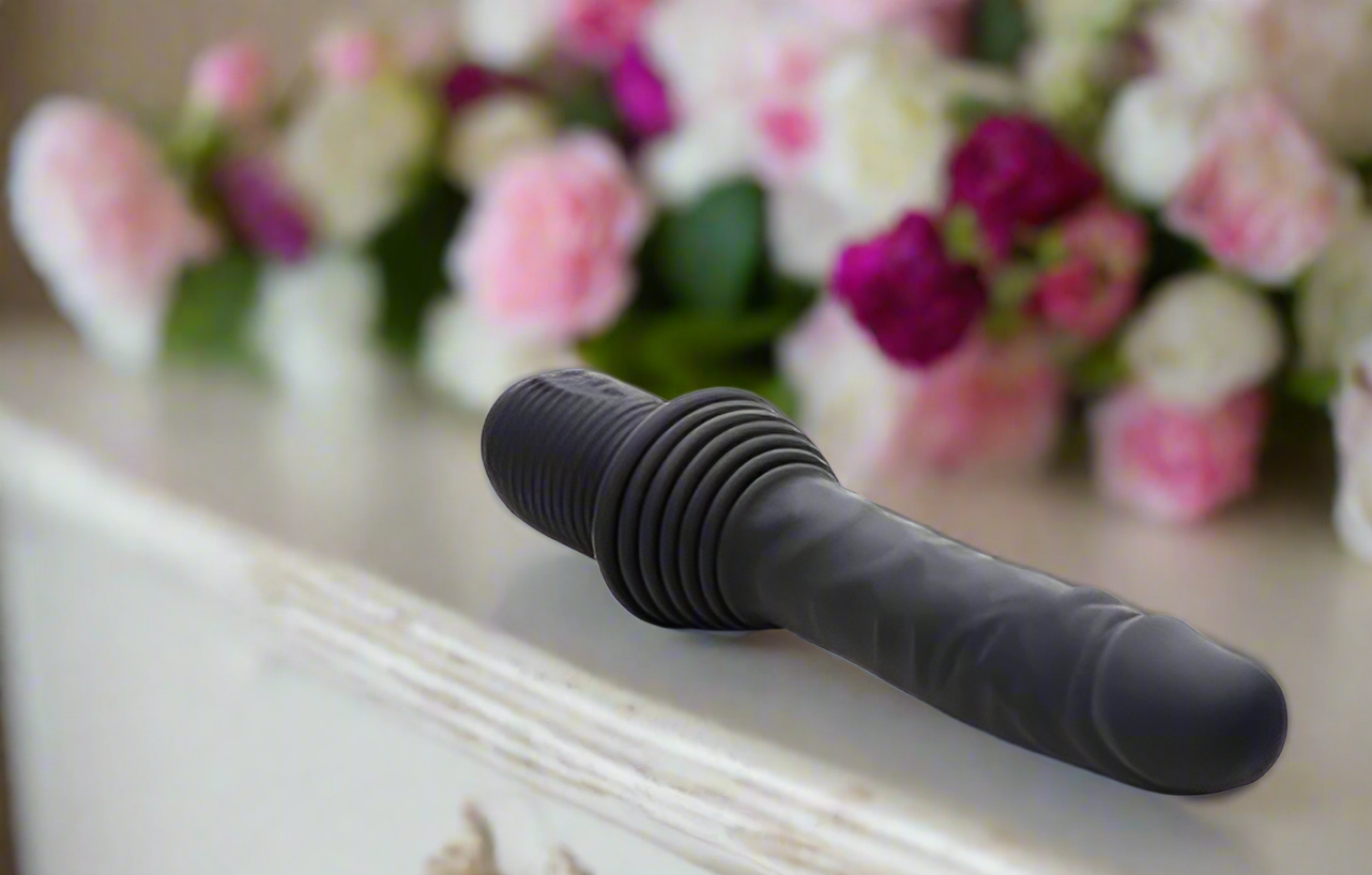 10x Silicone Vibrating And Thrusting Dildo XR LLC