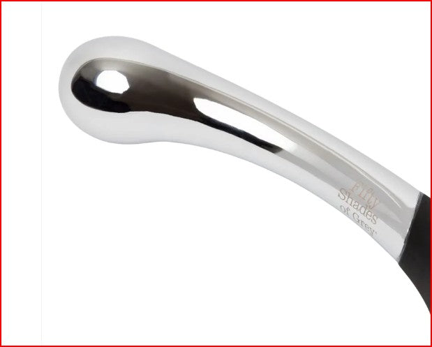 Fifty Shades of Grey Sweet Pressure Silicone & Metal Wand in an elegant setting, emphasizing its quality and sophistication for enhancing romantic experiences.