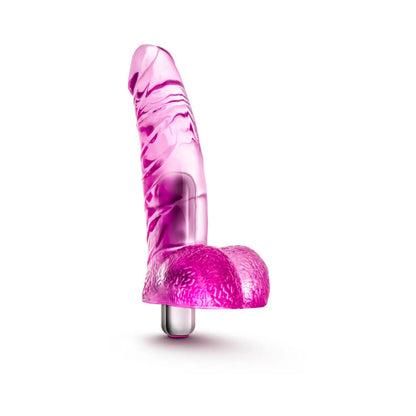 Naturally Yours Vibrating Ding Dong 6.5 in. Dildo with Balls &amp; Vibrator illustrating its body-safe materials and IPX7 waterproof rating.