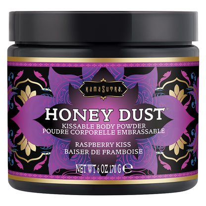 Kama Sutra Honey Dust-Raspberry Kiss body powder in an elegant container with a feather applicator, perfect for adding a kissable touch to your skin.