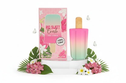 Pink and green gradient perfume bottle with matching packaging featuring floral designs.